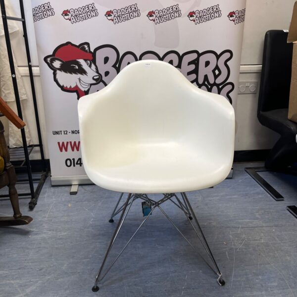White Vitra Eames Plastic Armchair with Eiffel base.