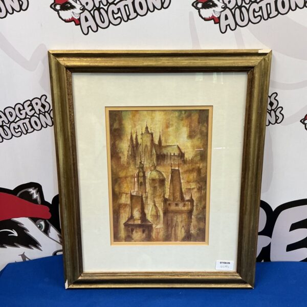 Framed watercolour painting of a continental city cathedral skyline.