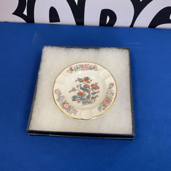 Vintage Wedgwood floral ash tray on display.