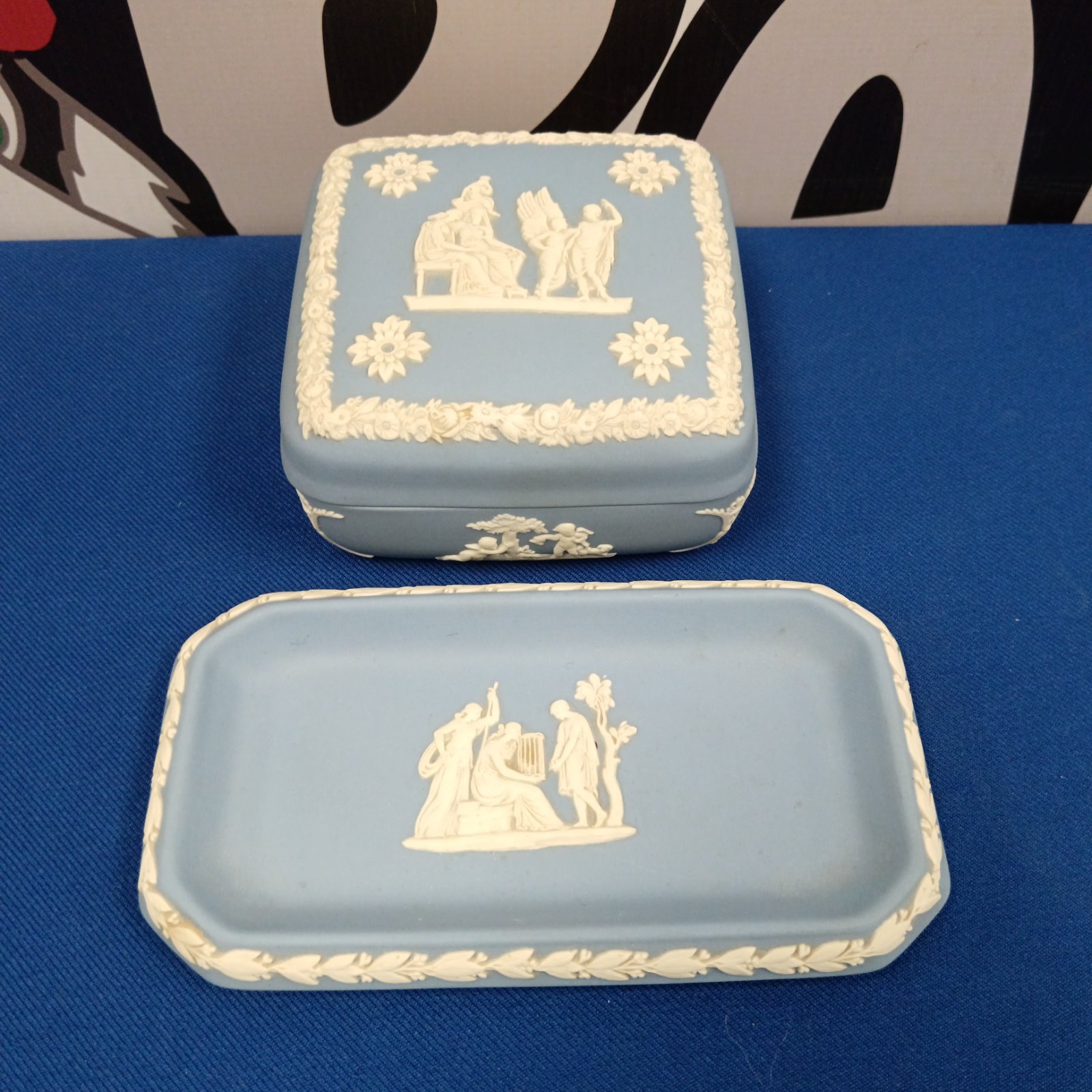Wedgwood Jasperware trinket pot with blue and white relief design.