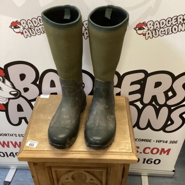 Dark coloured size 10 wellington boots for outdoor use.