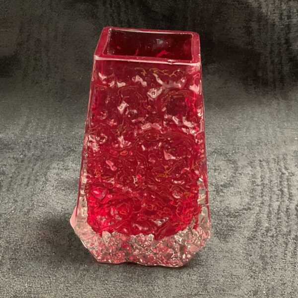 Red Whitefriars coffin vase with textured glass and a chip.