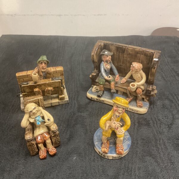 Group of four vintage Will Young Devon pottery comical figures.