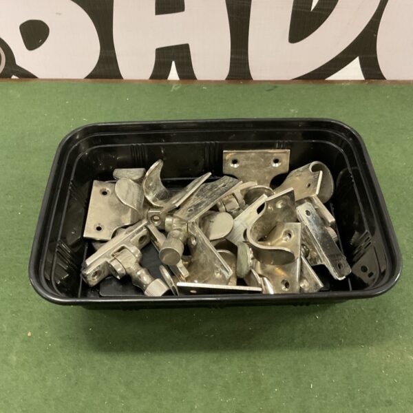 Vintage window fastenings and metal hooks for sash windows.
