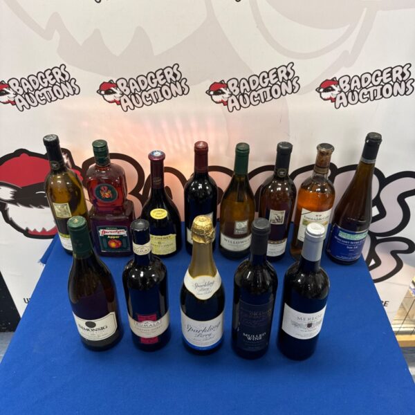 Mixed lot of wine and alcohol bottles from a house clearance.