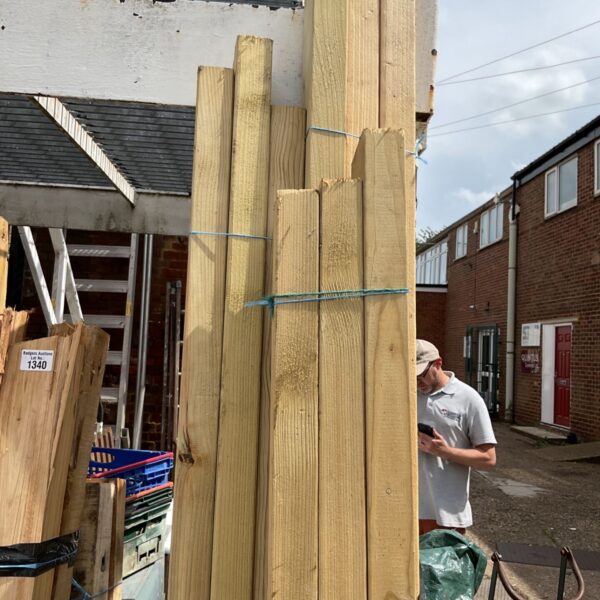 Lot of nine wood planks for DIY projects.