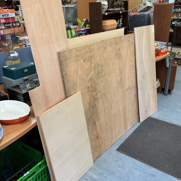 Stack of wood sheets for DIY projects and building.
