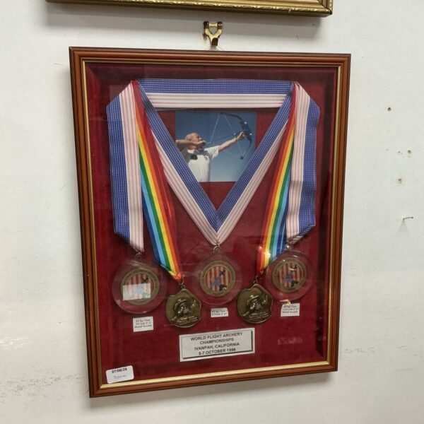 Framed set of World Flight Archery Championship medals from Ivanpah, California.