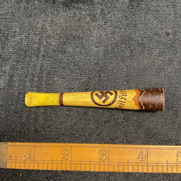 Vintage WWII German cigar holder with "Heil Hitler" inscription.