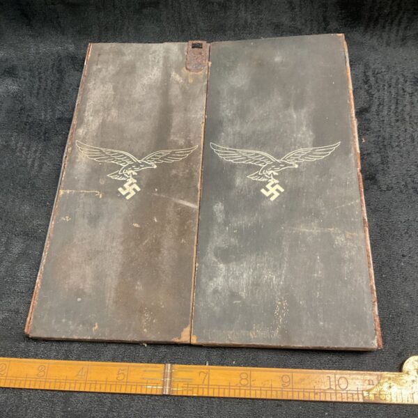 Vintage WWII Luftwaffe cabinet doors with German eagle emblem.
