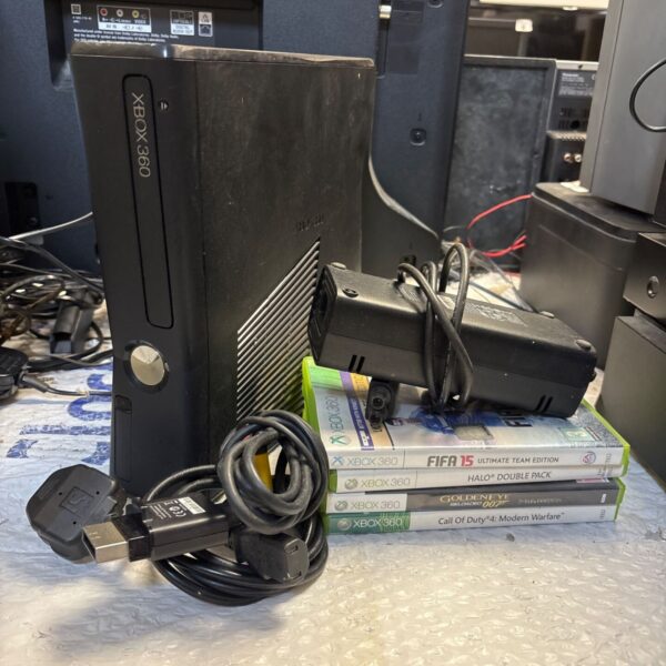 Xbox 360 console with games and power supply shown in detail.