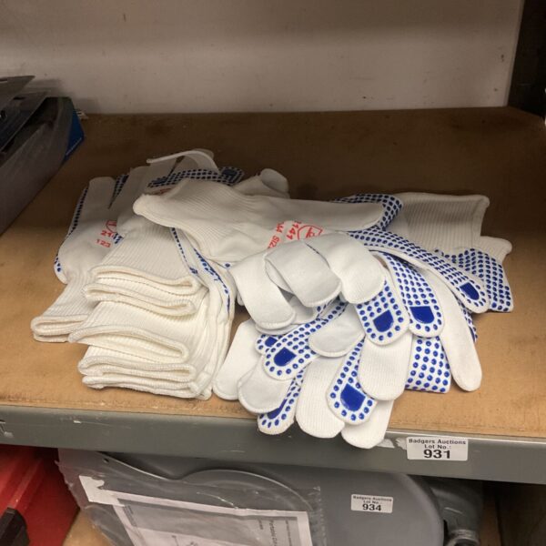 Bag of XL grip gloves with blue rubberised palms for work.