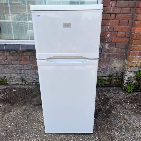 White Zanussi fridge freezer, freestanding kitchen appliance.