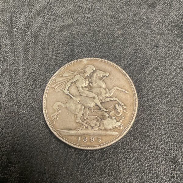 1895 silver crown showing Queen Victoria portrait.