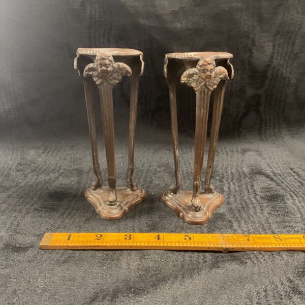 Antique 19th-century incense burner candlesticks with ornate detailing.