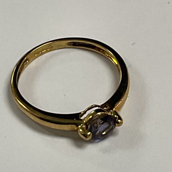 9ct gold ring with a vibrant amethyst solitaire stone.