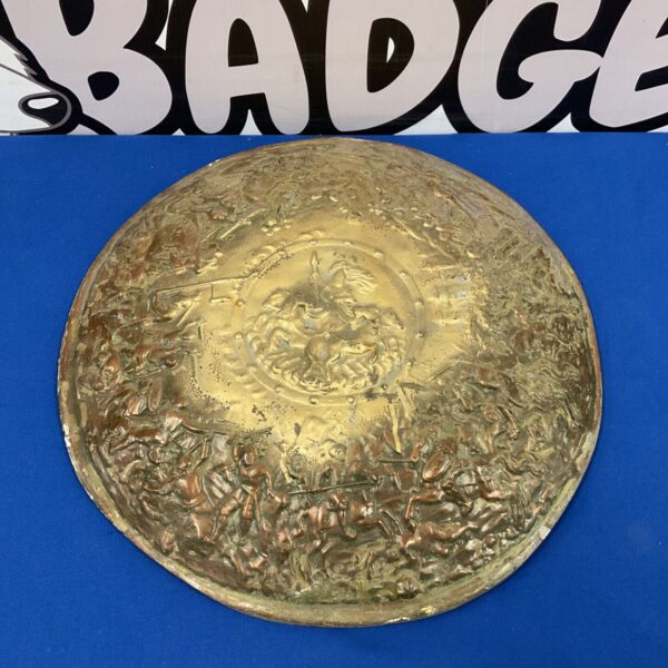 Detailed Achilles shield replica with battle scenes, bronze effect.