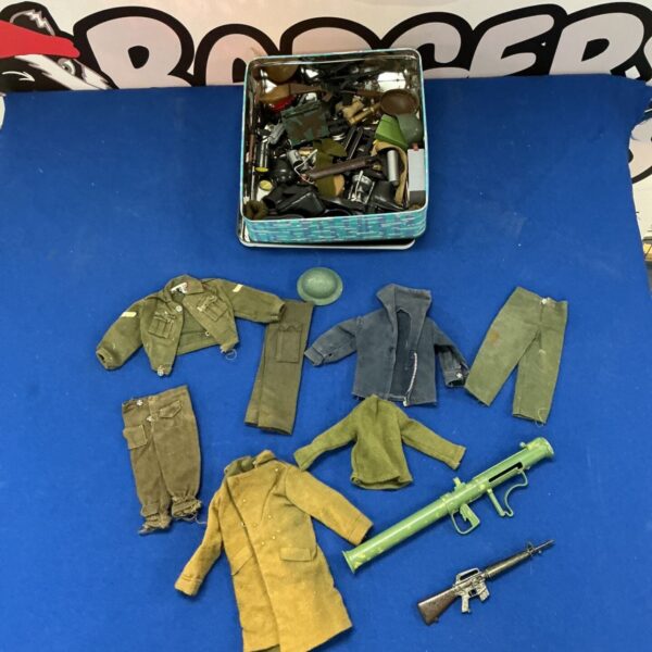 Vintage Action Man clothing and accessories in a tin.