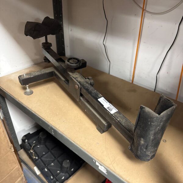 Metal adjustable rifle rest for shooting accuracy.
