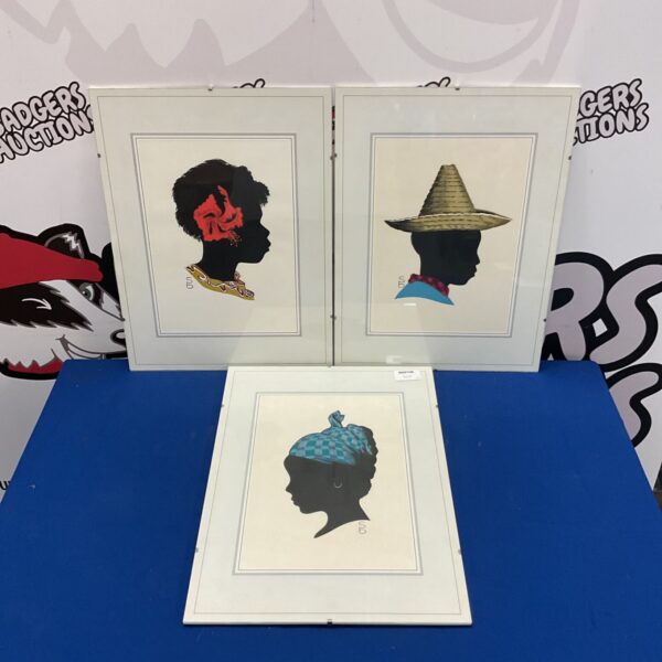 Framed set of three African silhouette watercolour and ink artworks.