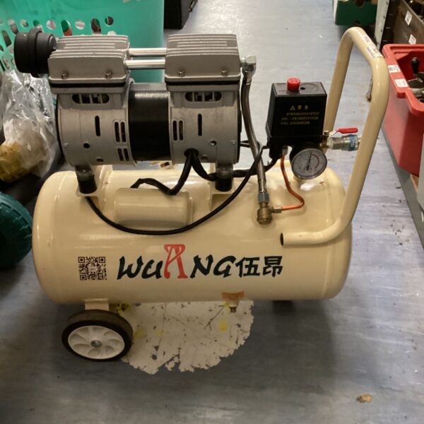 Portable oil-free air compressor with wheels for workshop use.