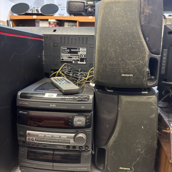 Vintage Aiwa HiFi system with remote control displayed.