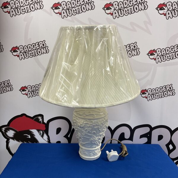 White ceramic Allders table lamp with a new lampshade.
