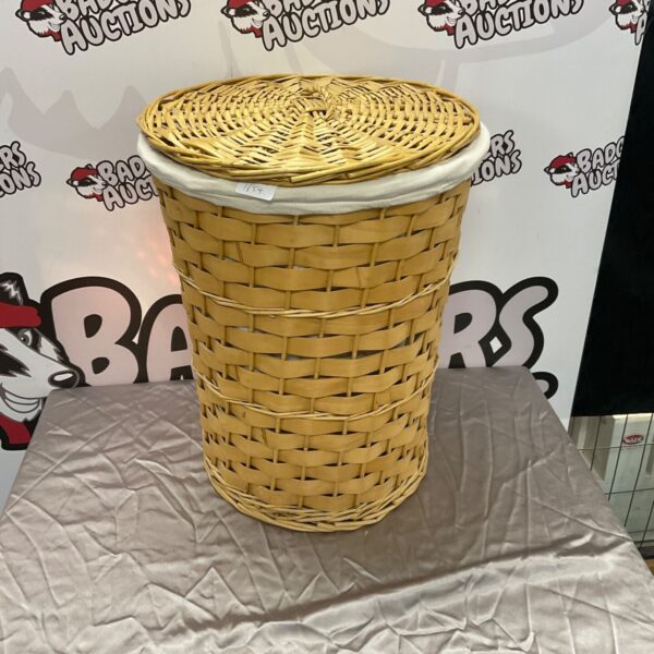 Amber ratten woven laundry basket for home storage.