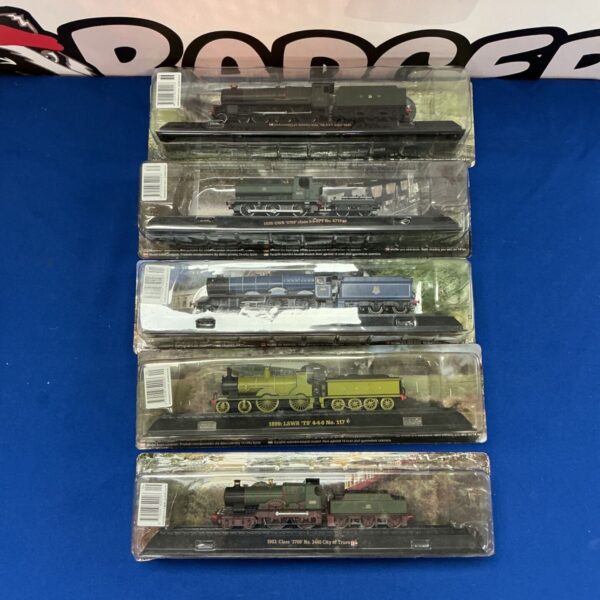 Lot of five AmerCom British train scale models in original packaging.