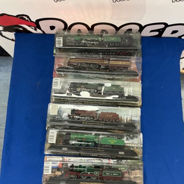 AmerCom model trains in boxes, HO scale collectible railroad set.