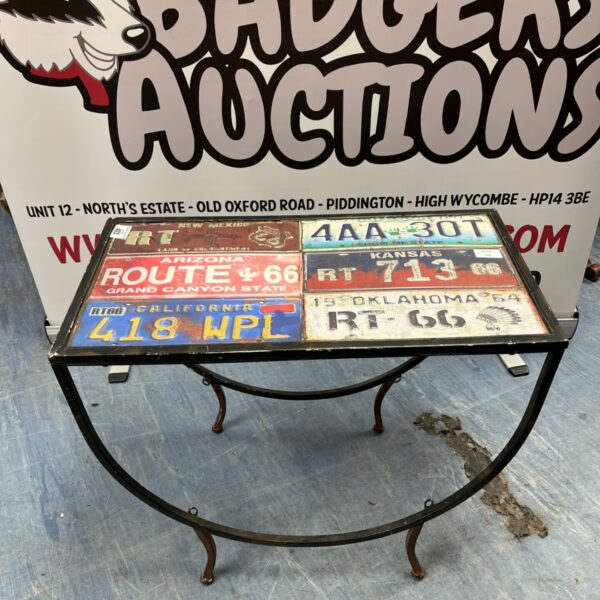 Vintage American vanity plate metal side table with tripod base.