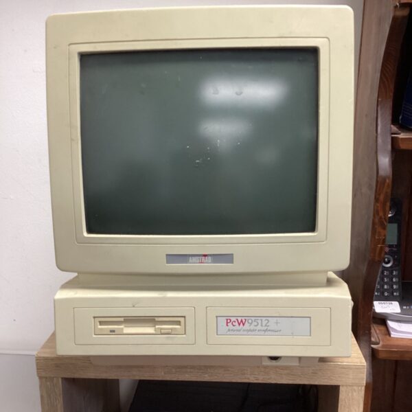 Vintage Amstrad PCW9512 computer, a classic 1980s home computer.