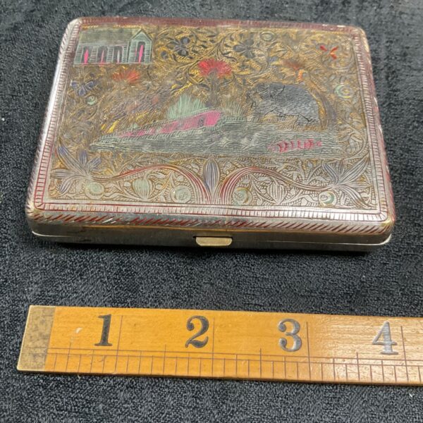 Antique Anglo Indian silver cigarette box with detailed map lid.