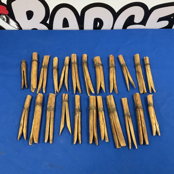 Antique banded wooden pegs, a collectible lot of vintage woodworking fasteners.