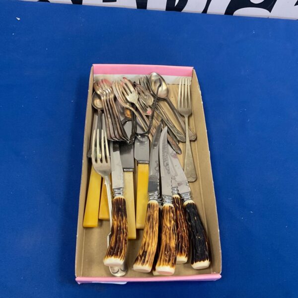Antique bone handle cutlery set with silver plated blades.