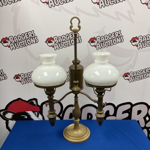 Antique brass student oil lamp with glass shades.