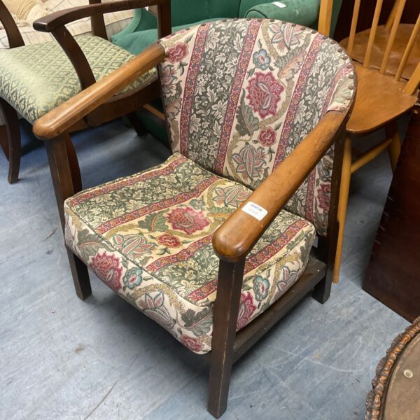 Antique Brentwood armchair with colourful patterned upholstery.