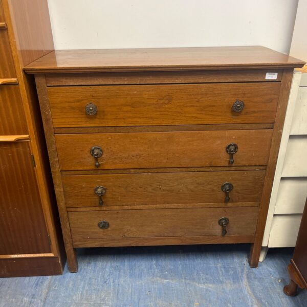 Antique cherry Sheraton style chest of drawers with four drawers.