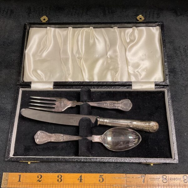 Antique Henry Knowles christening set with knife, fork, and spoon in a case.