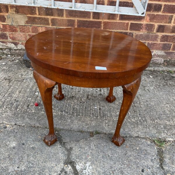 Antique claw foot coffee table with mahogany or walnut finish.