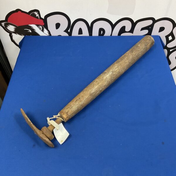 Antique cobbler’s last leg, a vintage shoe repair tool.