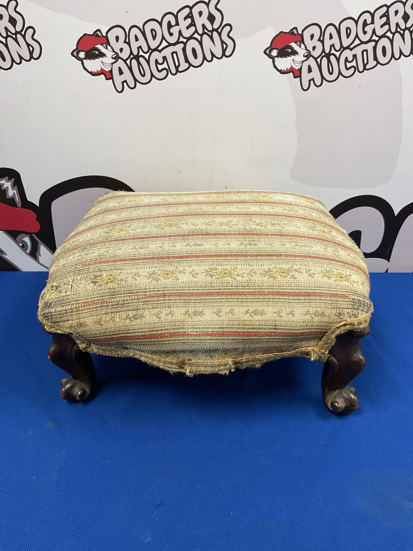 017 Antique footstool with claw feet