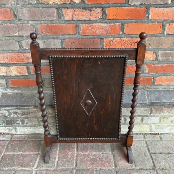 Antique jacobean revival barley twist fireguard for fireplace.