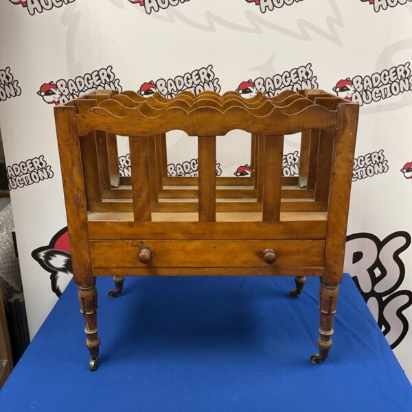 Antique mahogany Canterbury with four divisions and a drawer.