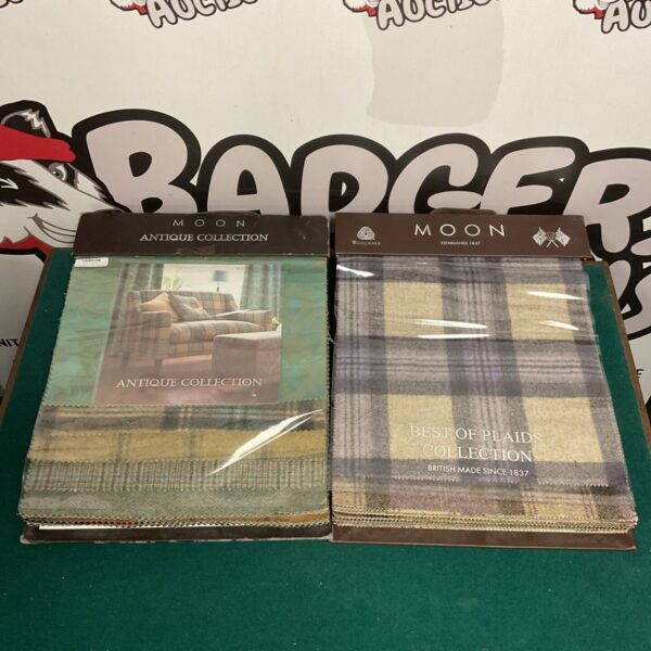 Antique Moon fabric sample book with patterned swatches.