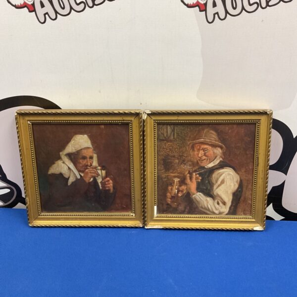 Pair of antique oil on board portraits in gilded frames.