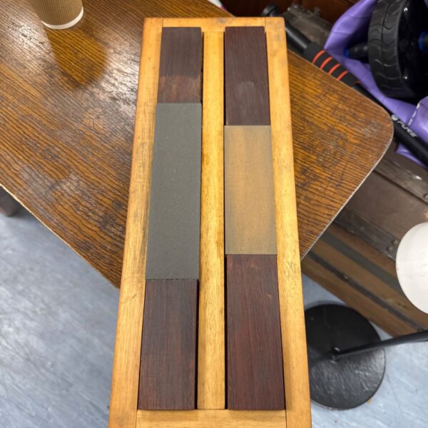 Antique oil stone set for sharpening tools and chisels.