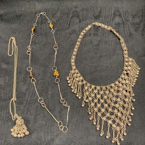 Antique tribal chainmail necklace with cascading pendant and tiger eye beads.