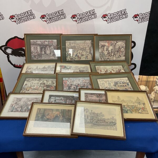 Collection of framed Anton Pieck prints depicting charming vintage scenes.