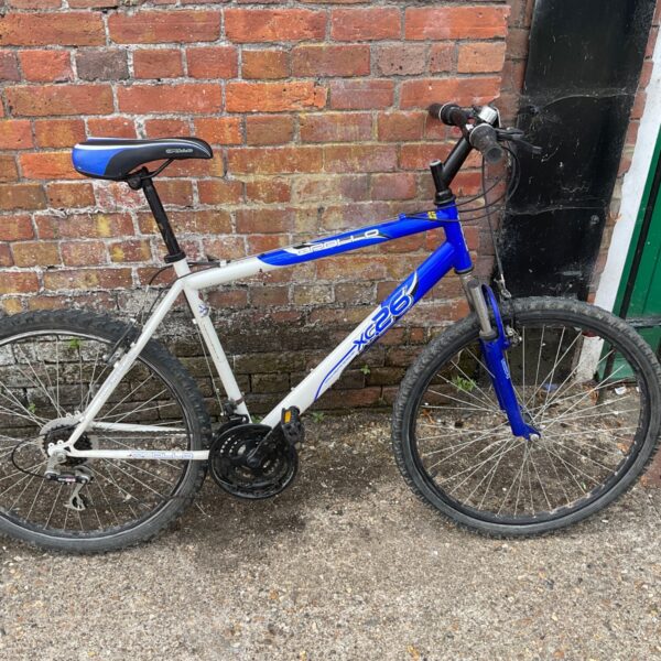 Silver and blue Apollo XC26 mountain bike for sale.